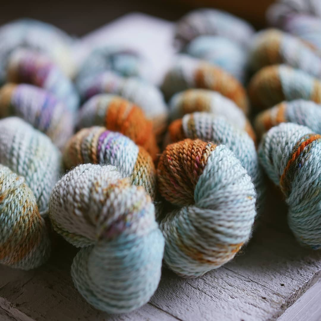 Shop locally hand-dyed luxury yarn for knitting, crocheting, weaving and more.