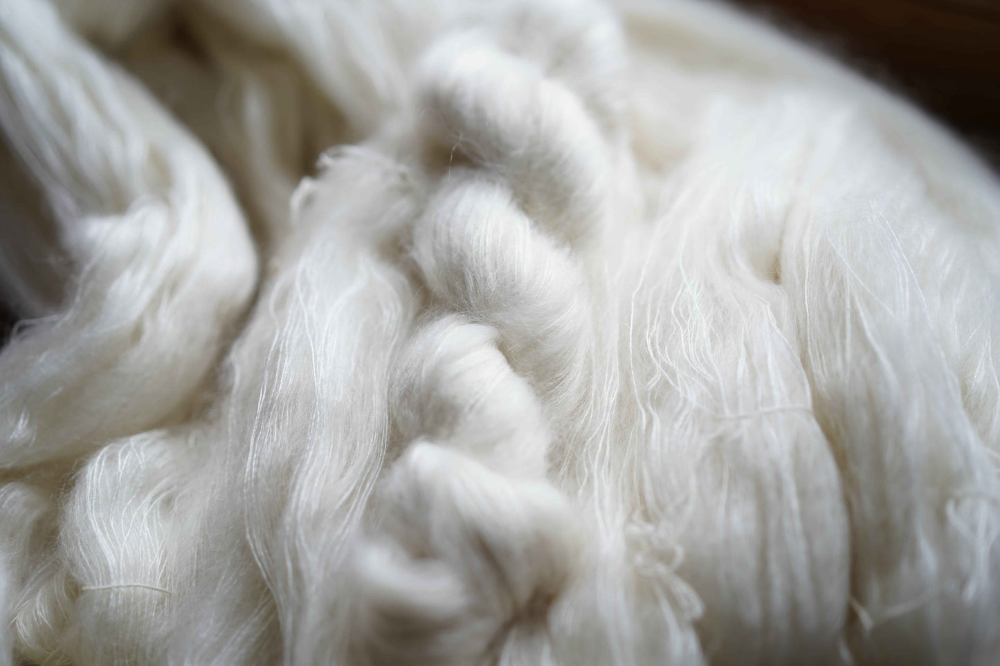 Undyed Mohair Silk Yarn 50g in lace weight, featuring a soft blend of 60% kid mohair and 40% silk, ideal for hand knitting and crochet projects.